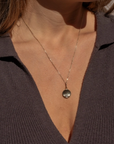 Thatch Birth of Venus Charm on neck image