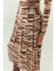 Long-sleeve dress with a pattern on a light background