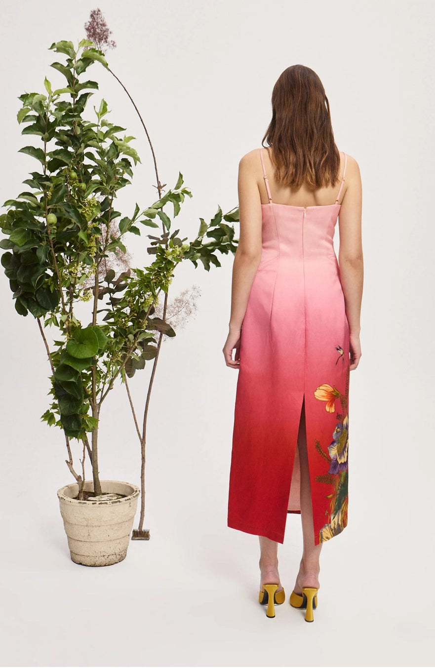 Inez Dress from Alemais back view of pink to red dress with floral print.