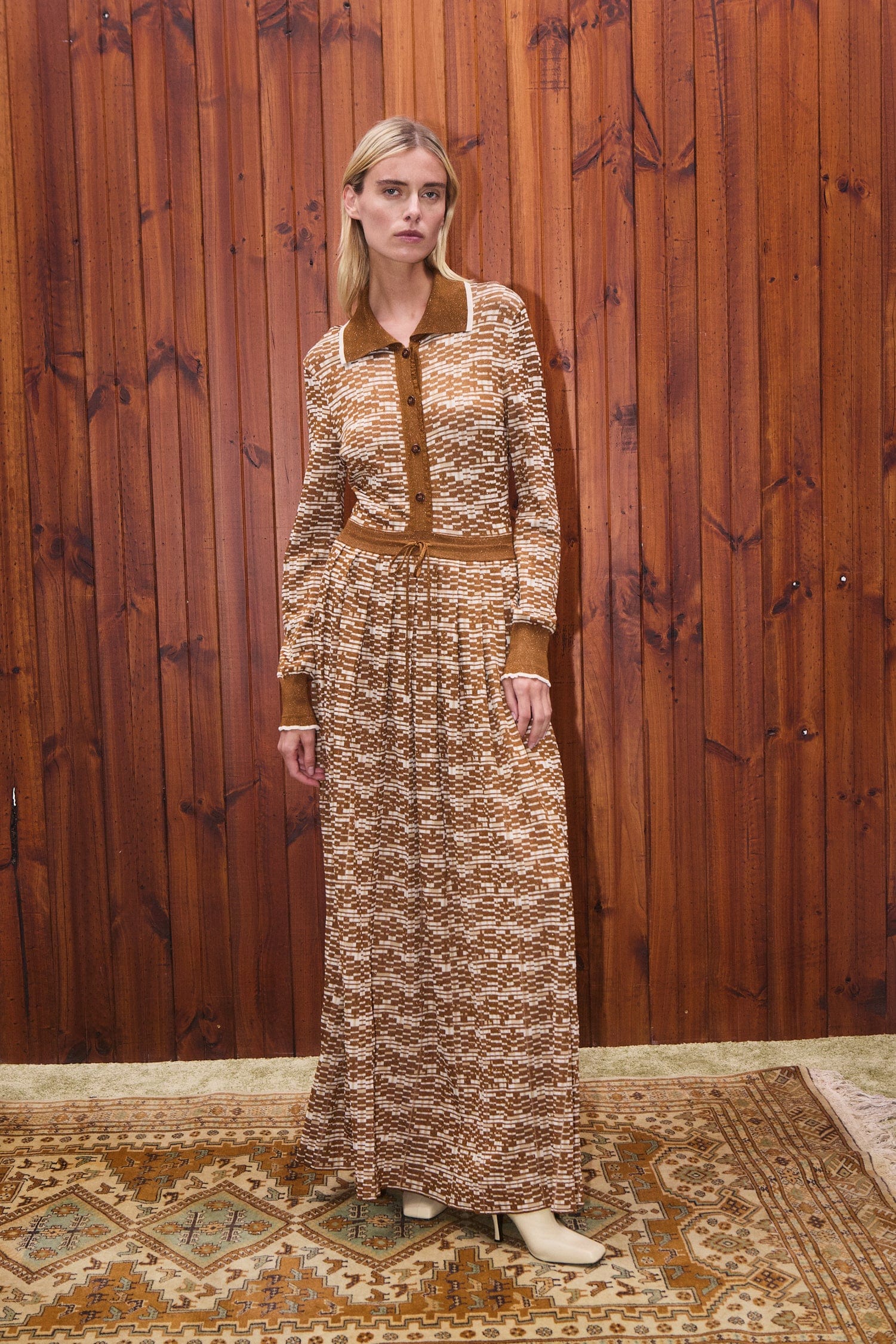 Alemais Sustainable Stefanie Knit Shirt Dress. Patterned Dress in a lifestyle image. 