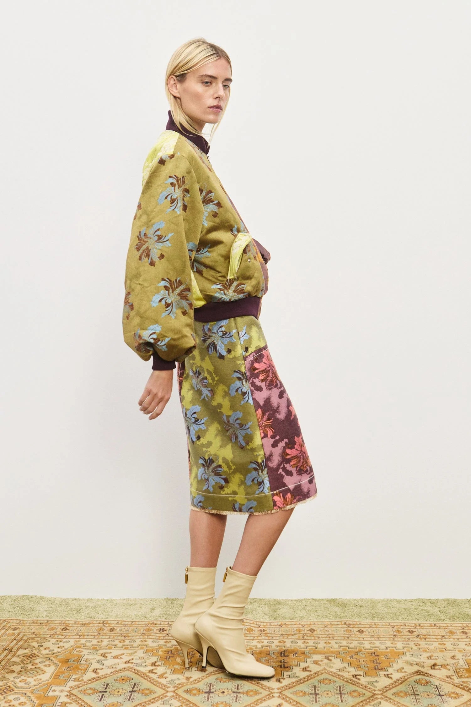 Adriana Jacquard Bomber Jacket by Alemais. A Floral patterned jacket with a mix of colors side view with Adriana Skirt.